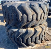 (2) FireStone 15-19.5 NHS Heavy Equipment Wheels